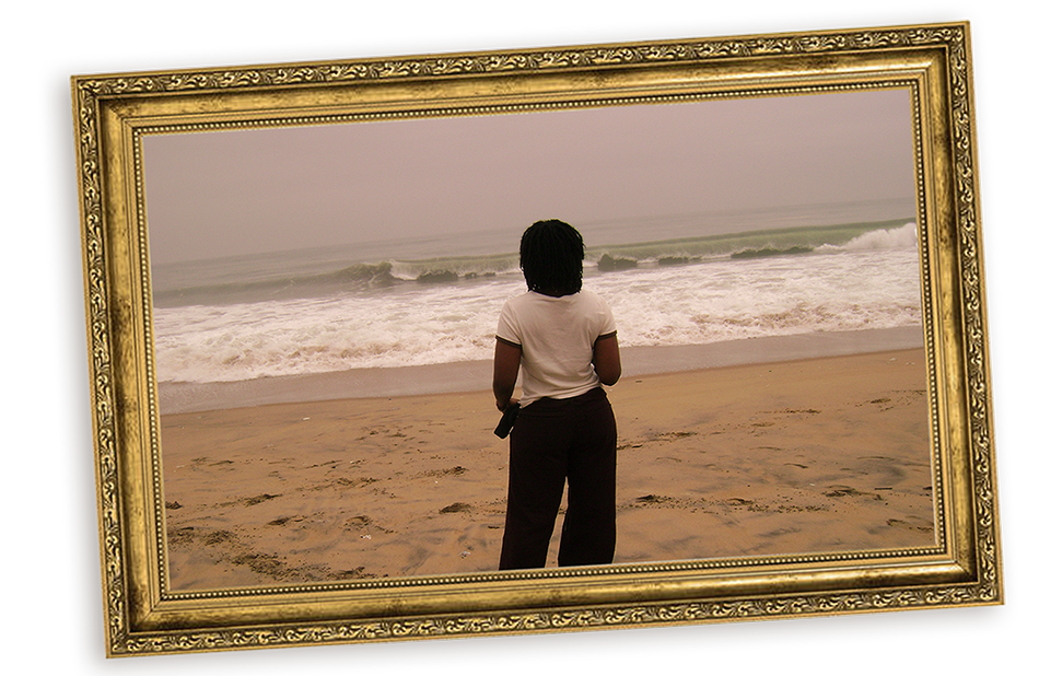 salima standing with aura at the beach